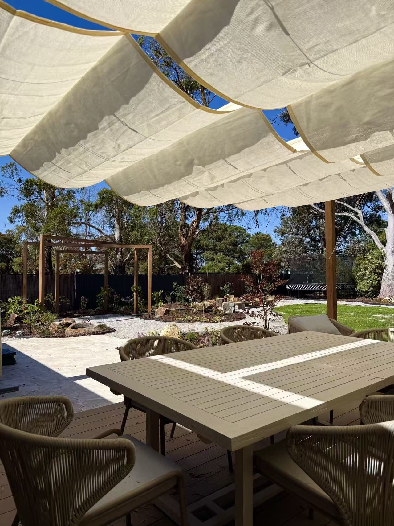 Finchwood House alfresco dining under sail shades